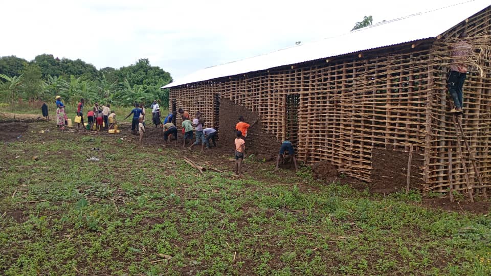 Village members coordinating construction progress
